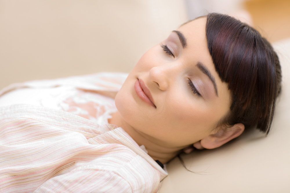 Brunette woman sound asleep&nbsp;